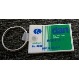 Advertising Rubbery Keychain Dan Day and Night Banker Sidney Ray Constantine
